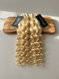 raw loose curly blonde hair (temporary image)